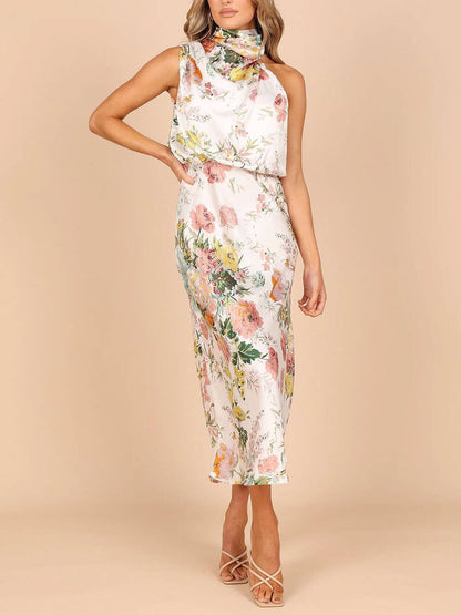 Robe longue fleurie à encolure dos-nu et taille élastiquée