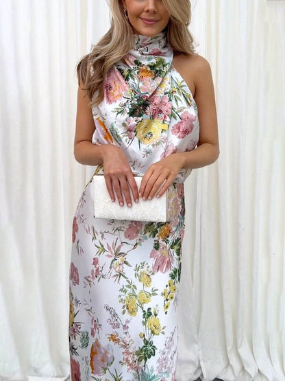 Robe longue fleurie à encolure dos-nu et taille élastiquée