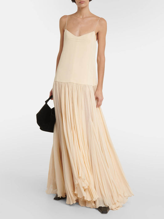 Robe asymétrique à fines bretelles et taille basse