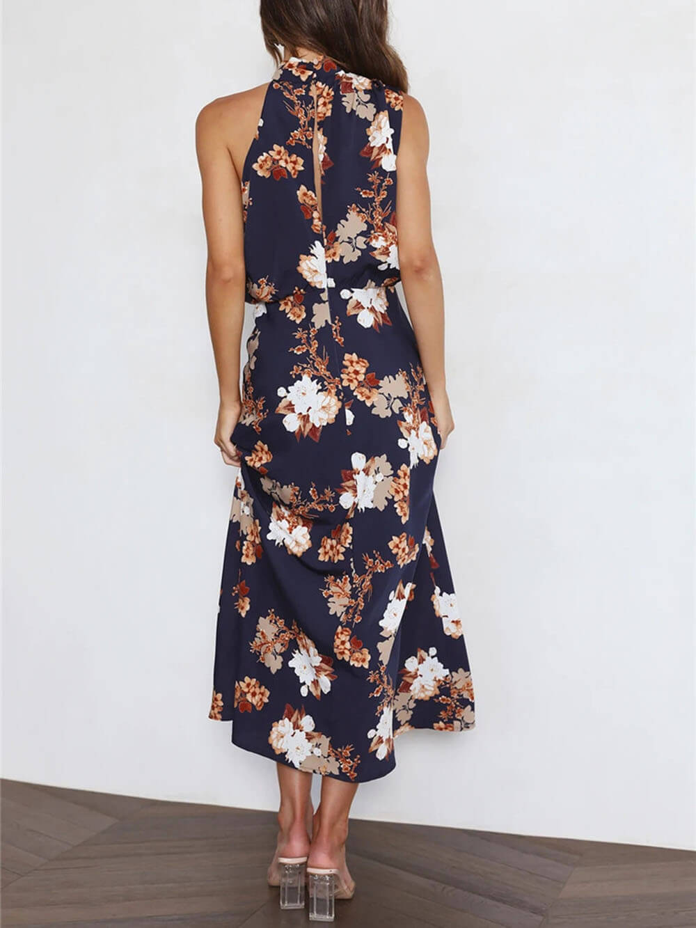 Robe longue fleurie à encolure dos-nu et taille élastiquée