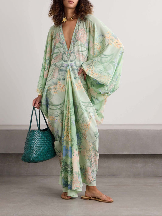Robe midi ample à col en V avec imprimé floral unique